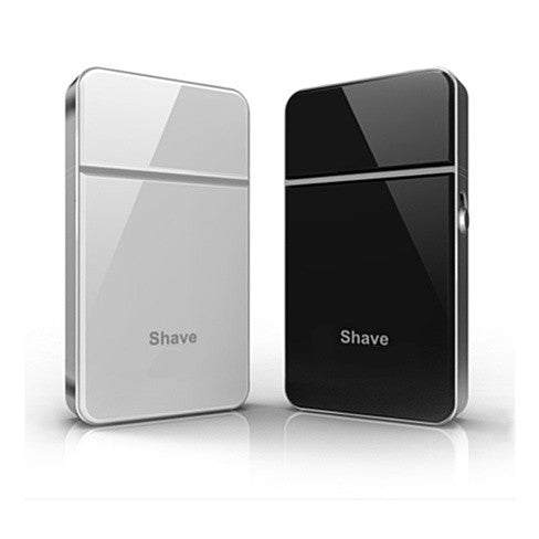 Chic Shaver portable USB rechargeable travel shaver with titanium coated foil in black and white